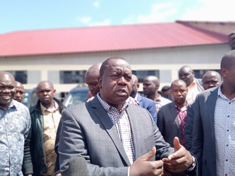 CS Interior Fred Matiangi addressing the press at Kenyenya SDA during the handing over the New constructed church sponsored by Gusii Professionals