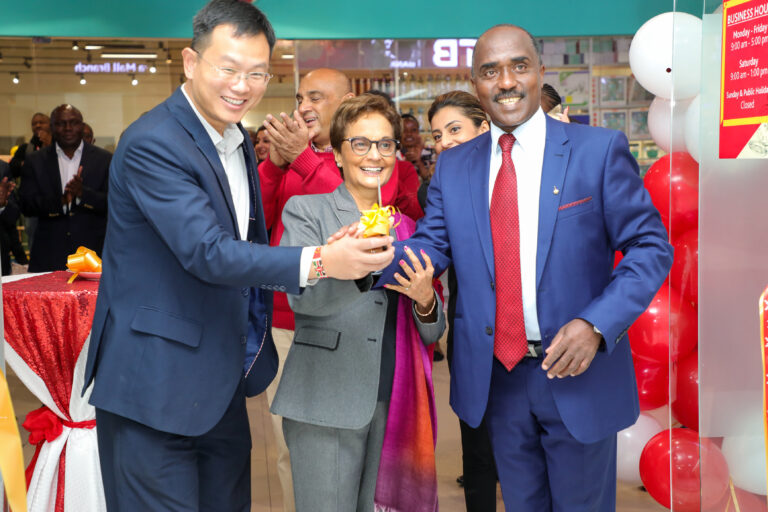 Picture caption_ Diamond Trust Bank (DTB) Kenya customer James Pan (left) joins DTB Group Chief Executive Officer Nasim Devji and Chairperson Linus Gitahi (right) at the official