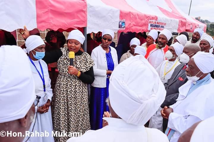 Nyeri County Women Representative Rahab Mukami (in flowered dress), Governor Mutahi Kahiga (in shirt) interacting with members of Akorino Church in Nyeri town yesterday.