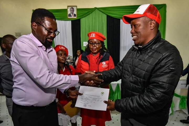 Governor Lee Kinyanjui being presented with his nomination certificate