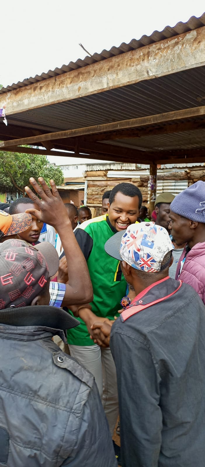 Irungu Nyakera in a chat with residents during his meet the people tour in Kandara on Sunday