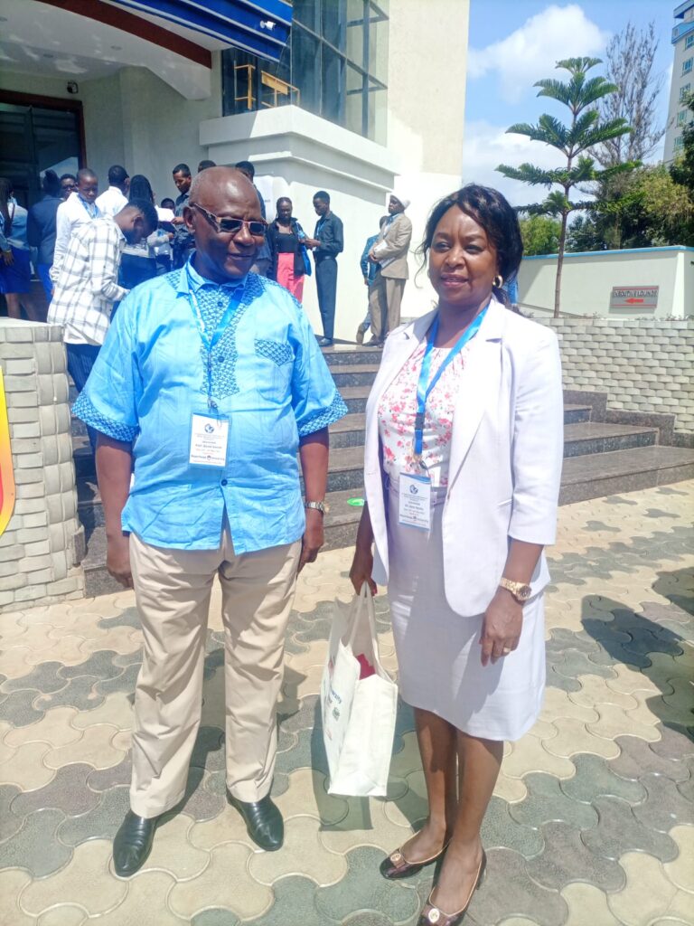 Mku co-founder Jane Nyutu and Varsity Council chair Prof. David Serem after yesterday's business