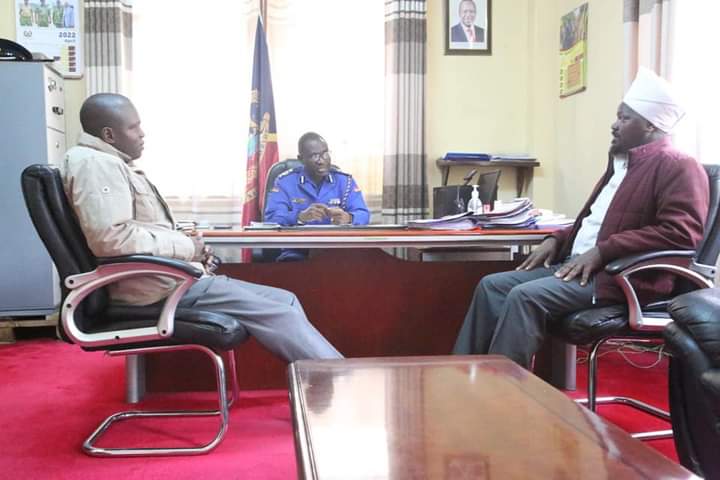 Mt Kenya region Bodaboda chairman John Nderitu (right) at the office of National Police Service spokesman yesterday.