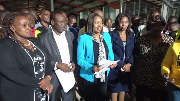 Nakuru Senator Susan Kihika issuing a statement on behalf of the local leadership. Tabitha Karanja (3rd right) and other leaders listen.