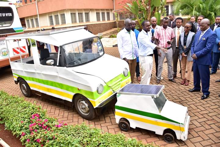 Nyeri County governor Mutahi Kahiga (right) listens to some of the innovators who showcased their talents yesterday.