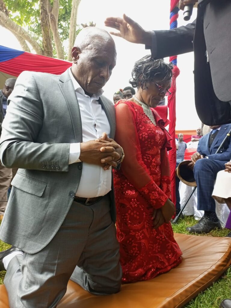 Nyeri County gubernatorial aspirant Dr Thuo Mathenge and his deputy nominee Dr Esther Wanjiru being blessed by their parents and clergy at Itundu Village, Mathira constituency on Saturday.