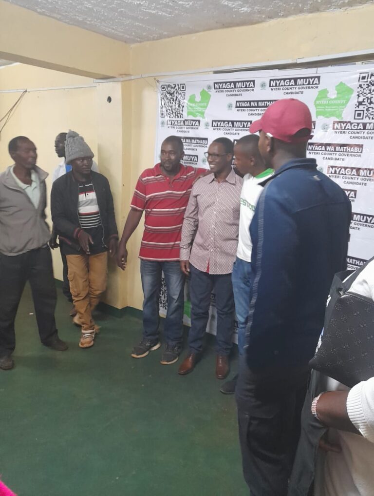 Nyeri County gubernatorial aspirant Nyaga Muya (3rd right) in discussion with his supporters at Senior Chief Wambugu Palace near Nyeri town yesterday.