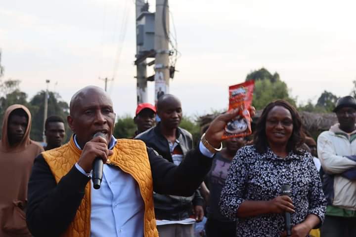 Nyeri County gubernatorial candidate on The New Democrats (TND) ticket Dr Thuo Mathenge with his deputy Ms Mary Gathoni Kihara during their campaign in Ruguru, Mathira constituency on Tuesday.