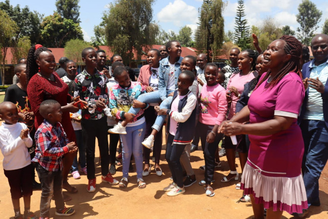 Parents and pupils of Public school in Meru celebrating