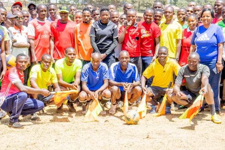 Some of the referees pose for a group photo after graduating