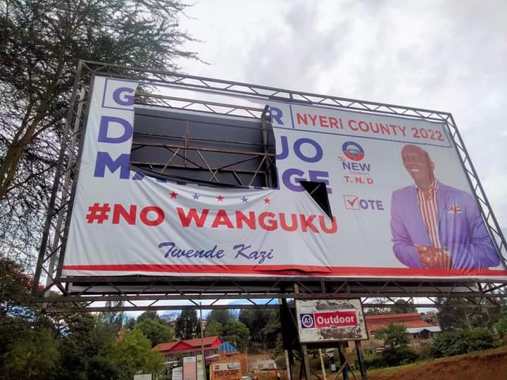 The billboard that was destroyed by unknown people.