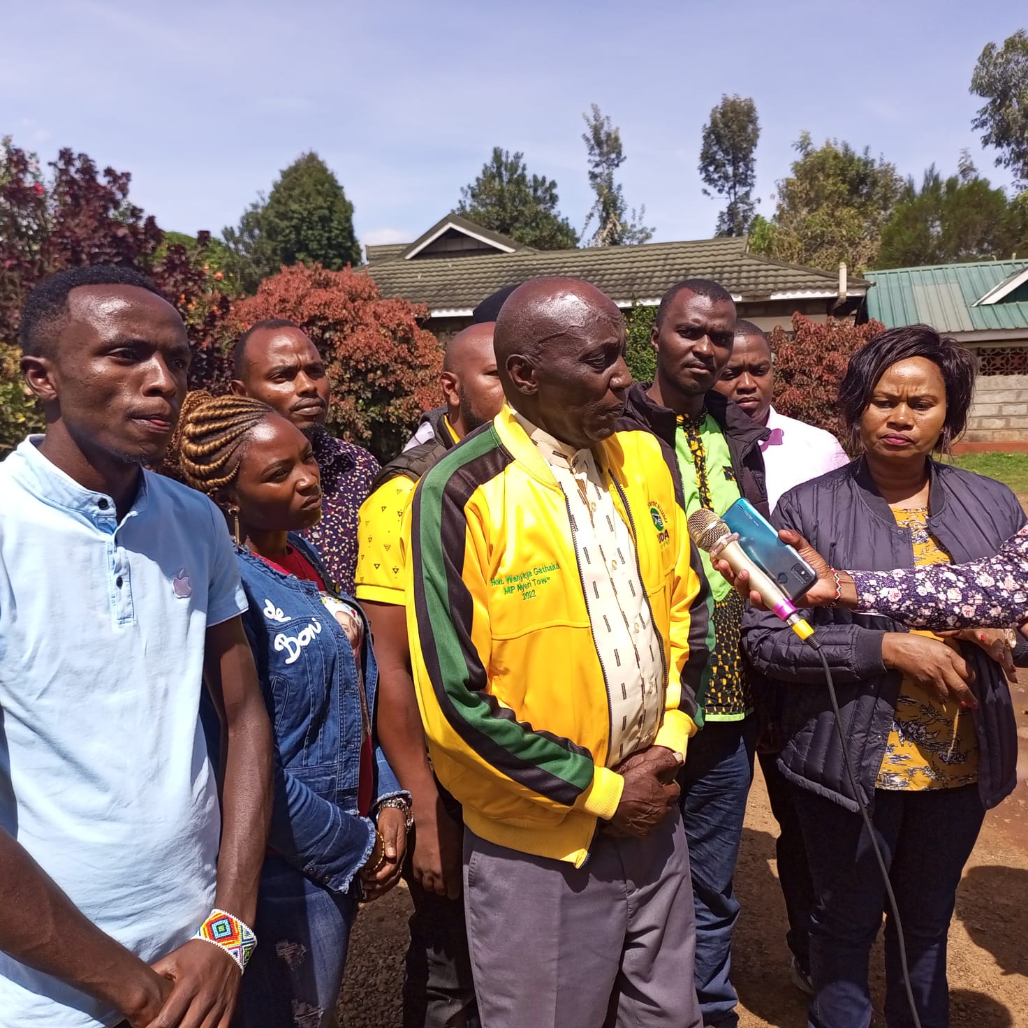 Wanyaga Gathaka (in yellow jacket) and Esther Ngima (right) addressing the media at Senior Chief Wambugu Palace.