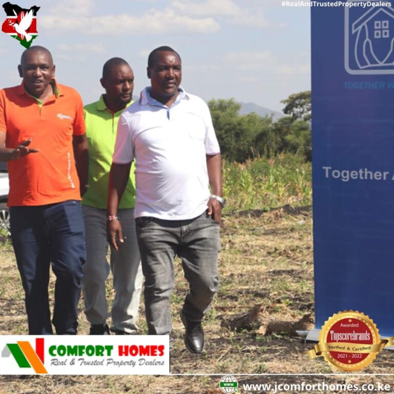 Dr. Hezekiah Kariuki, CEO of Comfort Homes (in white T-shirt) in one of the company's projects