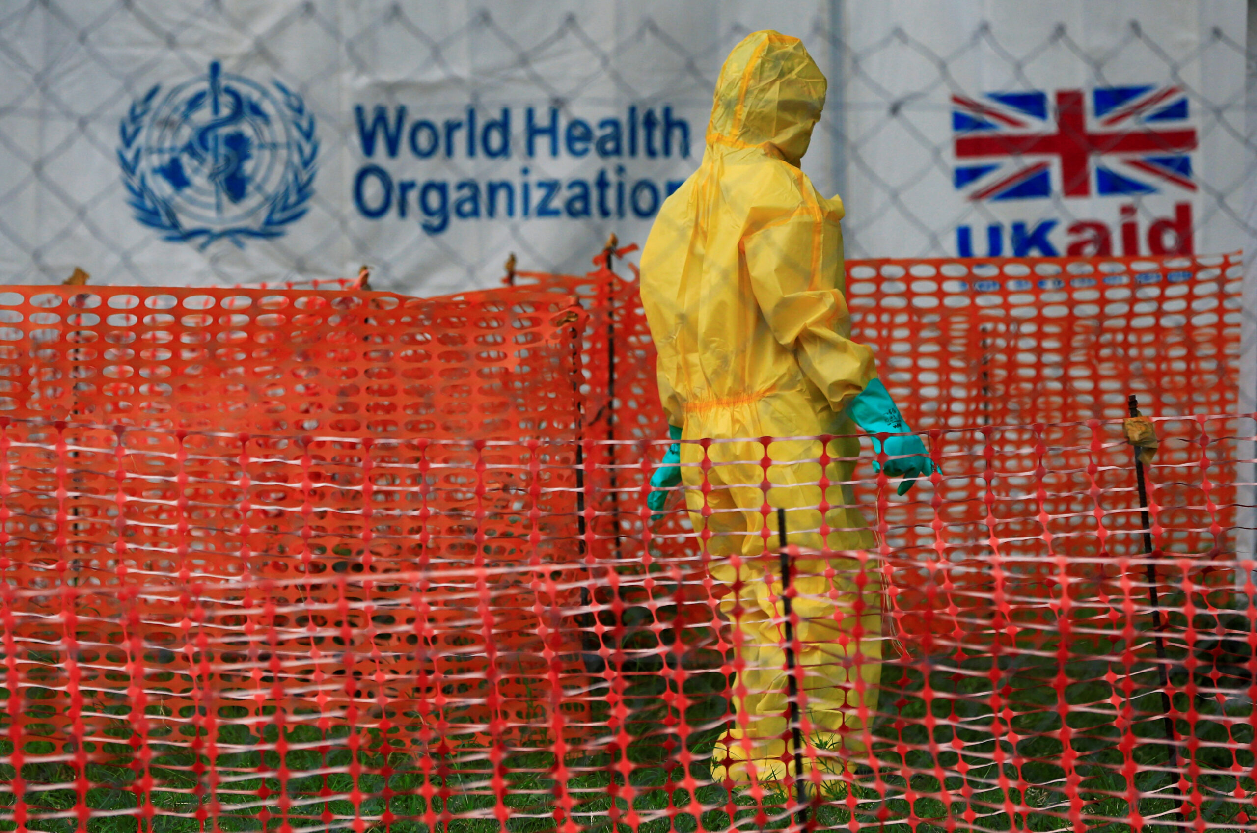 FILE PHOTO: A person dressed in ebola protective apparel is seen inside an ebola care facility at the Bwera general hospital near the border with the Democratic Republic of Congo in Bwera