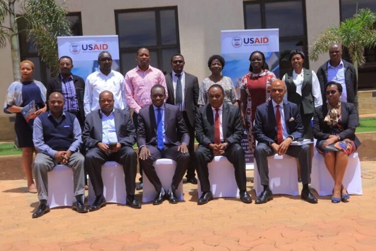 Kisii Governor Simba Arati 3rd from left front row with USAID team