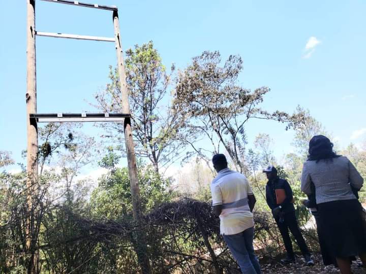 Mukurwe-ini MP John Kaguchia (left) when he inspected one of the electrification project in the area