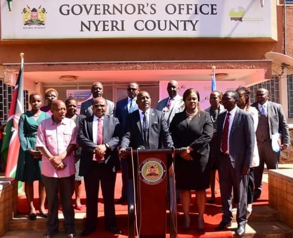 Nyeri County governor Mwalimu Mutahi Kahiga addressing journalists in the company of new partners after signing the MoU yesterday