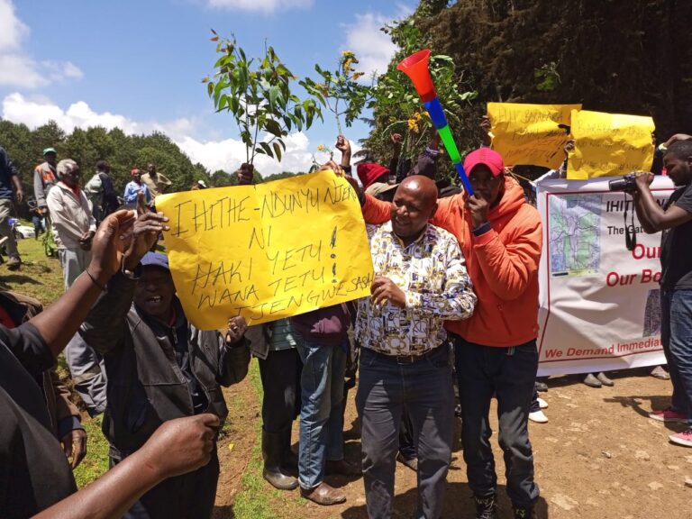 Tetu residents led by Alex Gathii (2nd right) matching at Ihithe area