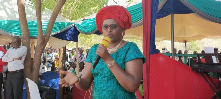 Tharaka Nithi County Woman Representative Hon. Susan Ngugi Mwindu speaks during the burial ceremony of Peter Njagi Mugwika at Gatunga