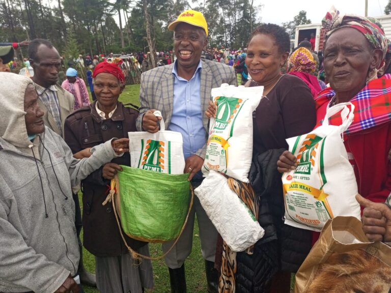 Kieni Member of Parliament Njoroge Wainaina during the distribution of foodstuff in Kamburaini in Kieni West on Saturday.