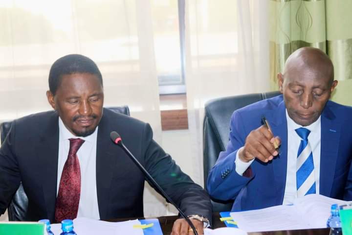 Members of Parliament Mwangi Kiunjuri (Laikipia East) and John Chege (Limuru) during yesterday's vetting session.