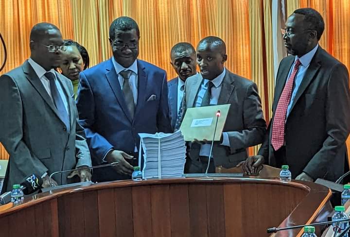 Members of joint committee on Election of Representatives to the EALA sampling some of the Applications.