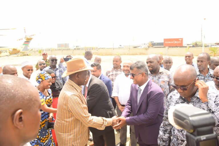 Narendra Raval Chairman of Devki Steel greets President William Ruto