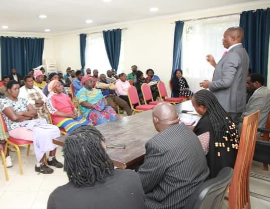 Nyandarua County Governor Moses Kiarie Badilisha addressing traders in Ol-Kalou town yesterday