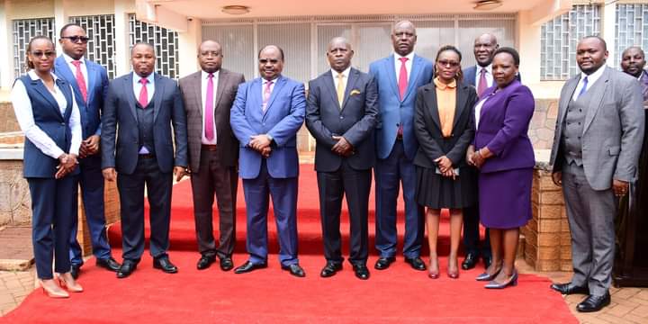 Nyeri governor Mutahi Kahiga and his deputy David Kinaniri pose for a group photo with CECs after they took oath of office yesterday.