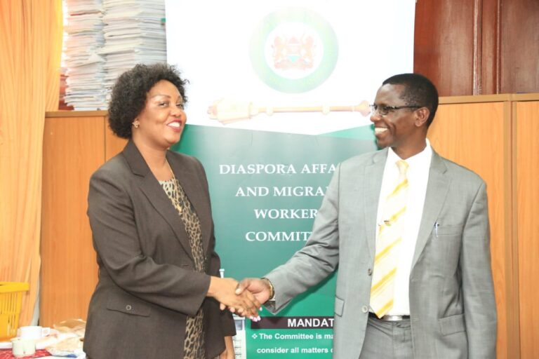 Taita Taveta Woman Representative Haika Mnene Mizighi shares a light moment with Ruiru MP Simon King'ara.