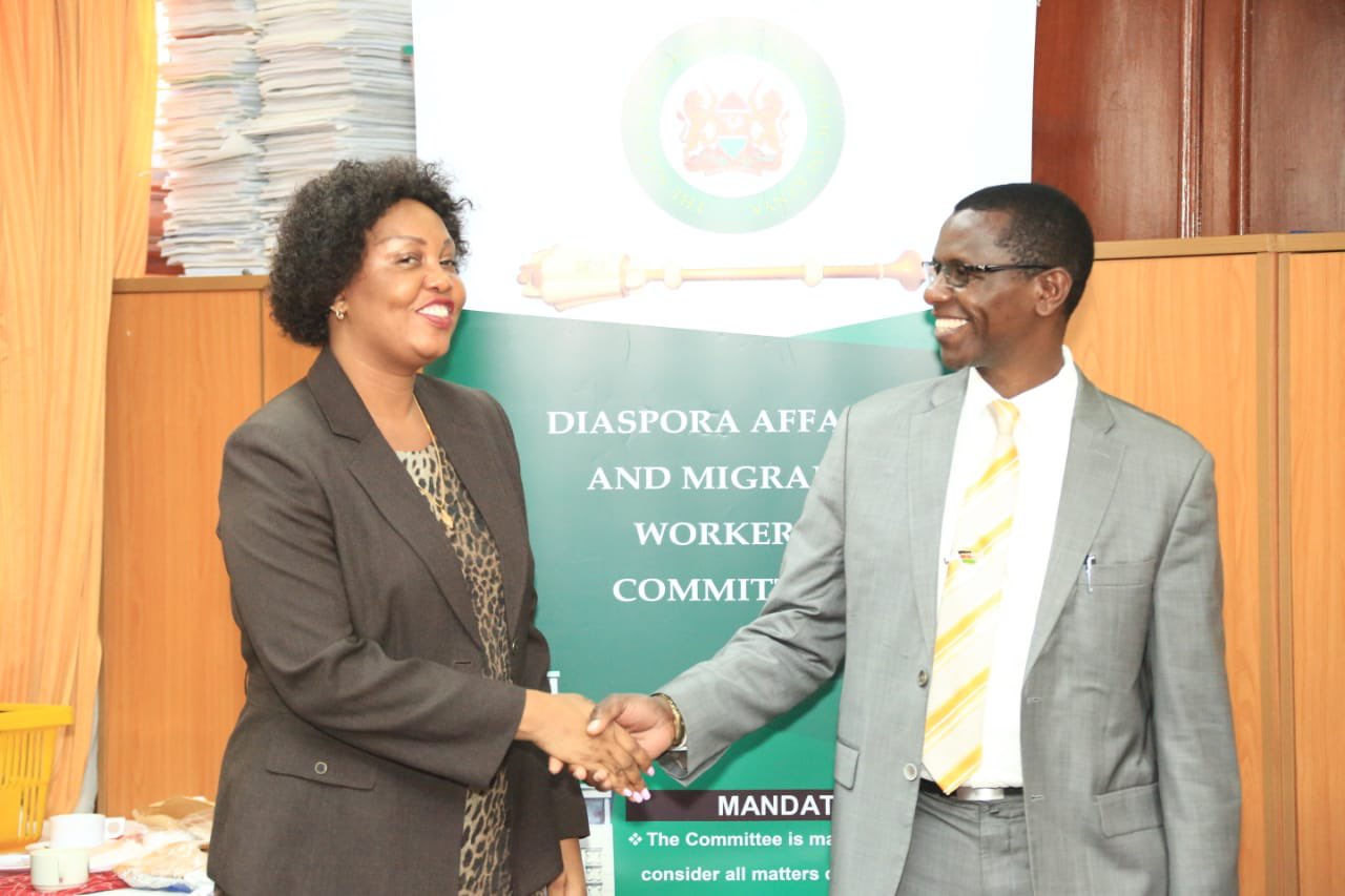 Taita Taveta Woman Representative Haika Mnene Mizighi shares a light moment with Ruiru MP Simon King'ara.