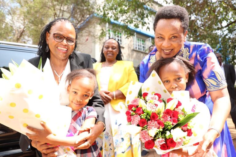 Chief Justice Martha Koome accepts pleasantries from children at the Mogra Rescue Centre.