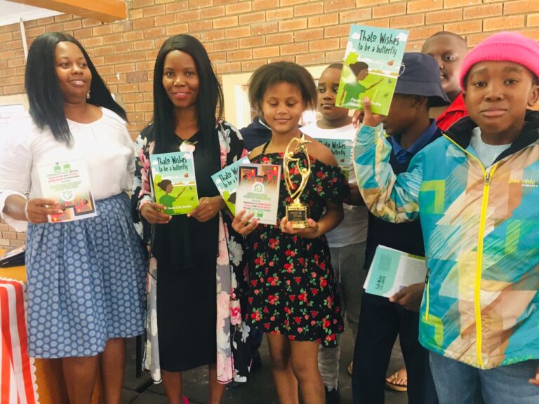 Dr Paula O.M.Otukile (Second left) with and others her authored books