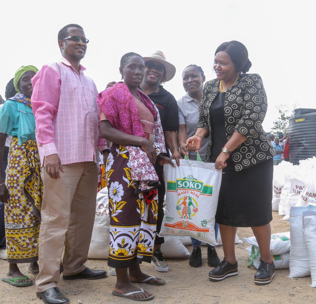 East Africa Community Cabinet Secretary Rebecca Miano (Right) led a food distribution exercise in Kilifi County.