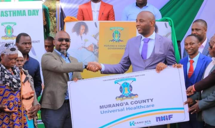 Murang’a County Governor Irungu Kang’ata with NHIF Chief Executive Officer Peter Kamunyu during the launch of the cover for vulnerable families in the county.