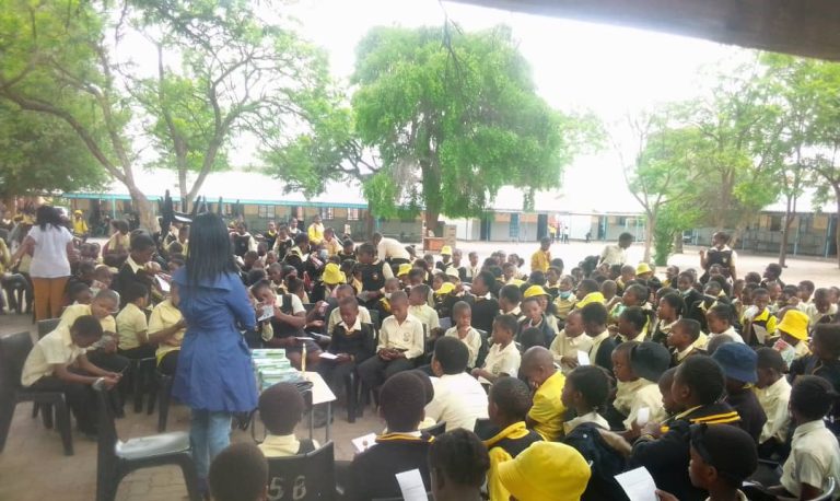 Dr. Paula with school children