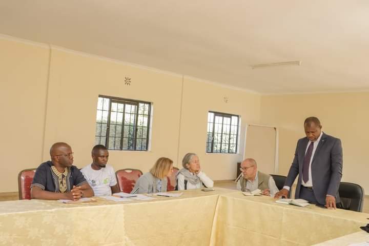 Laikipia County Deputy Governor Reuben Kamuri addressing the Habitat for Humanity team that called on him yesterday.