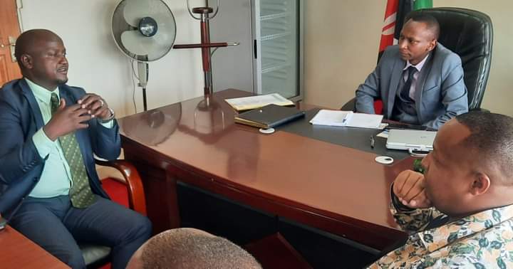 Murang’a County Deputy Governor Stephen Munania when he hosted Mlife Foundation President Mwangi Mukami and other officials during the discussion on how to improve coffee farmers proceeds.