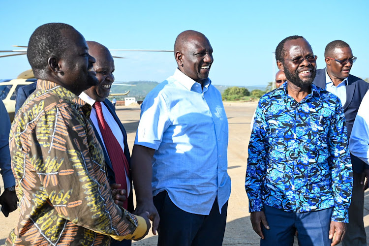 President William Ruto greeting the Kisumu County commisoner Josephine Ouko at the Kisumu Port