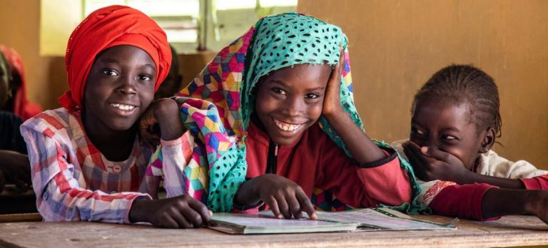 Girls study together at school