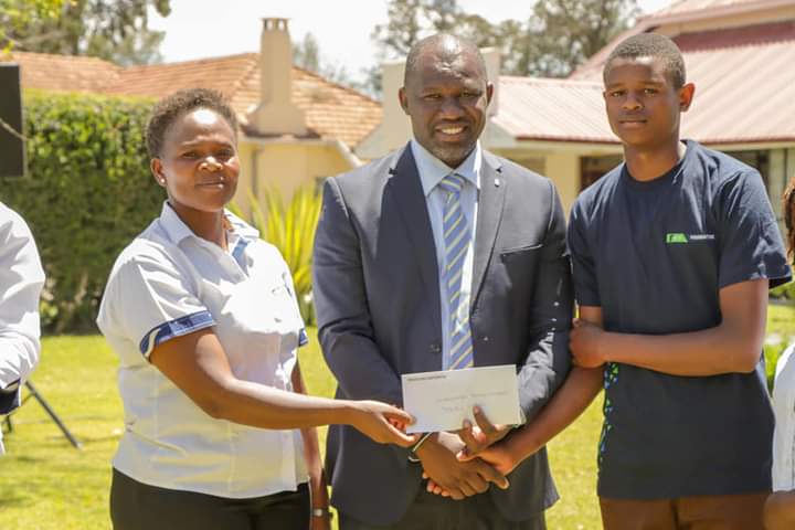 Laikipia County Deputy Governor Reuben Kamuri when he presided over handing over of scholarship to beneficiaries.