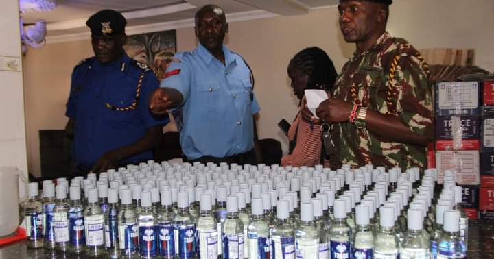Members of the Laikipia County multi-agency team who raided an illegal brewing den in Nanyuki town