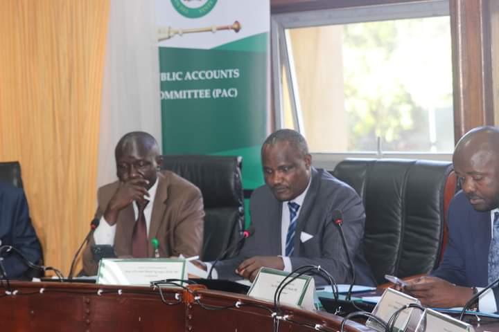 Parliamentary Accounts Committee (PAC) chairman John Badi (centre) with other members during yesterday's session.