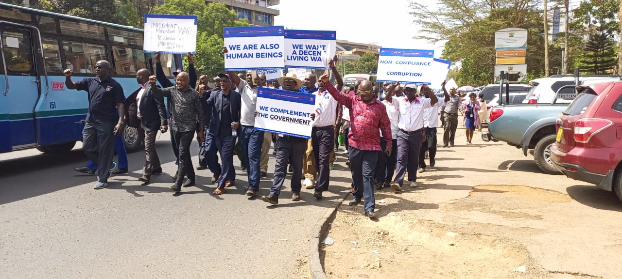 Private security workers' representatives held a peaceful procession in Nairobi yesterday