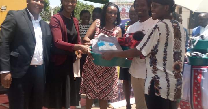 Tharaka Nithi county First Lady Margaret Muthomi with other leaders while giving out the goodies