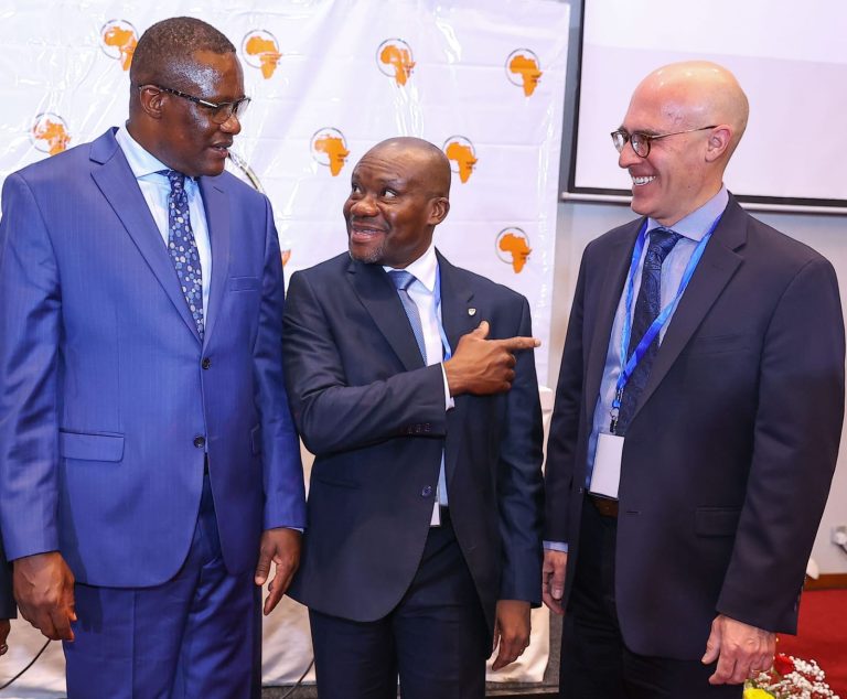 Cabinet Secretary Eliud Owalo (left) shares a light moment with AERC Acting Executive Director Prof Théophile Azomahou and Mr Dan Peters,