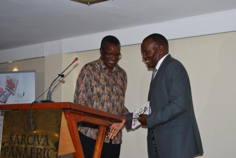 Dr.Vincent Gaitho, Pro Chancellor MKu (left) with CJ Emeritus David Maraga, chief guest during the launch of the book