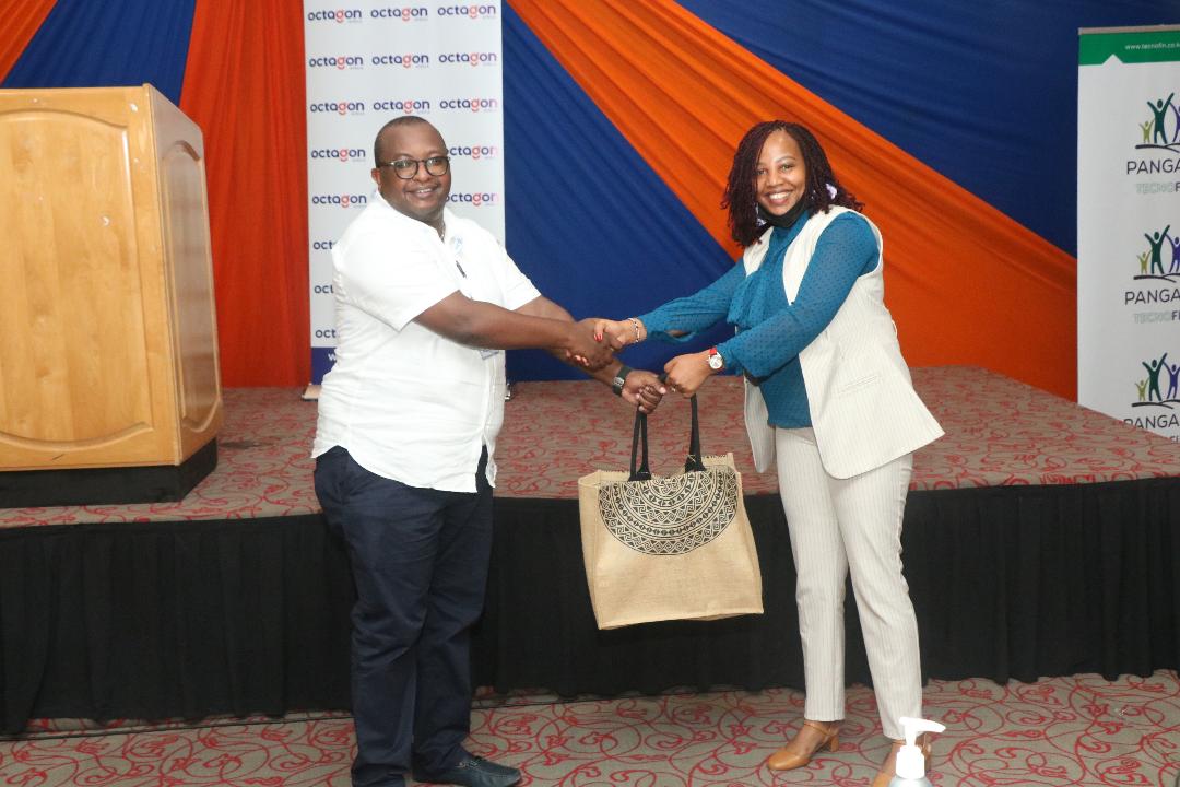 State Department of Housing and Urban Development Principal Secretary Charles Hinga and Octagon Africa General Manager Pensions Services Ruth Njuguna