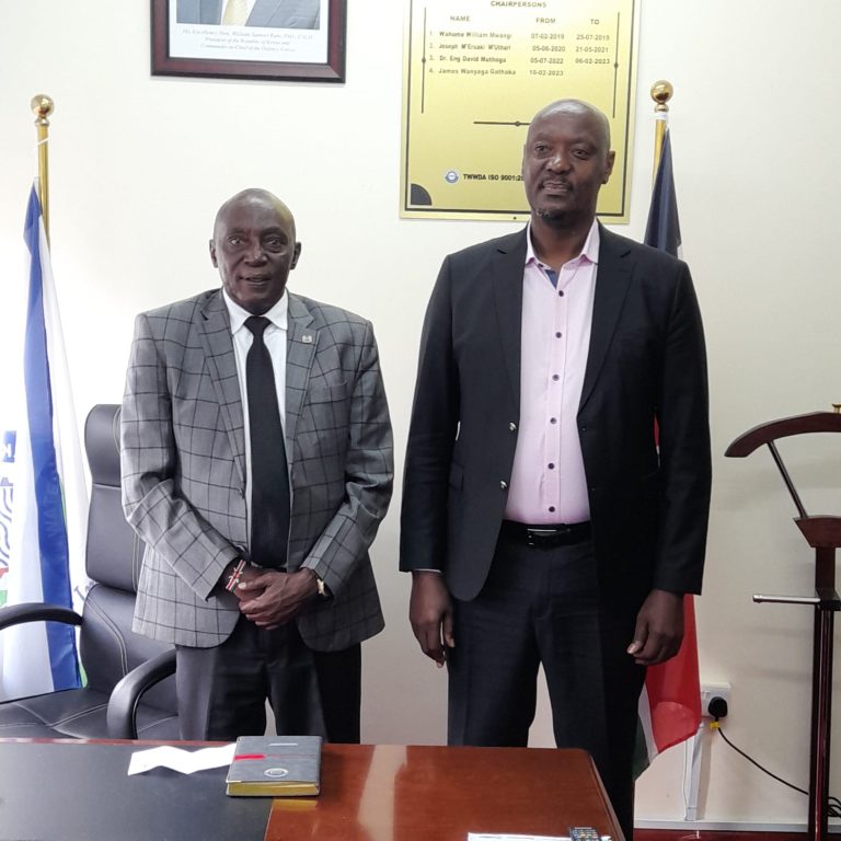 Tana Water Works Development Agency Chairman Wanyaga Gathaka (right) with Nyeri Town MP Duncan Maina Mathenge pose for a photo after a meeting yesterday