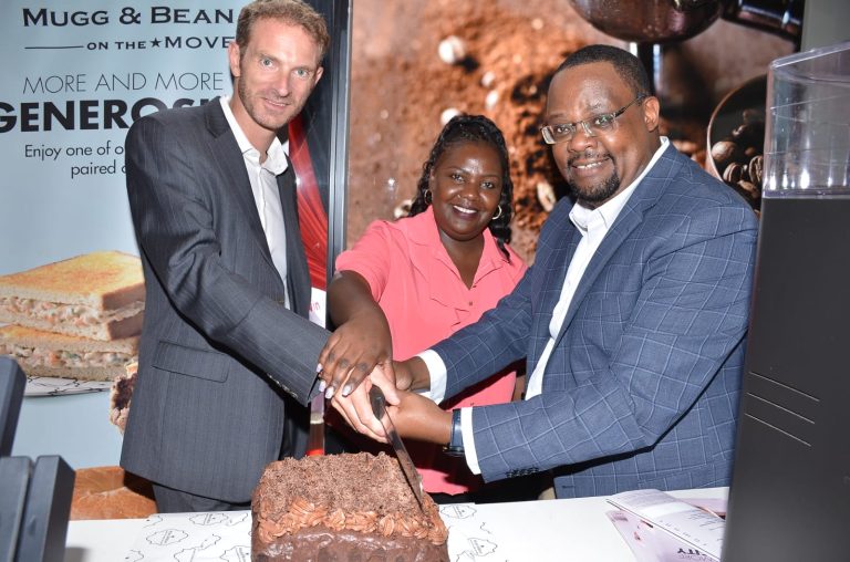 TotalEnergies Kenya Commercial Manager Retail & Card Christophe Wittmann (left),